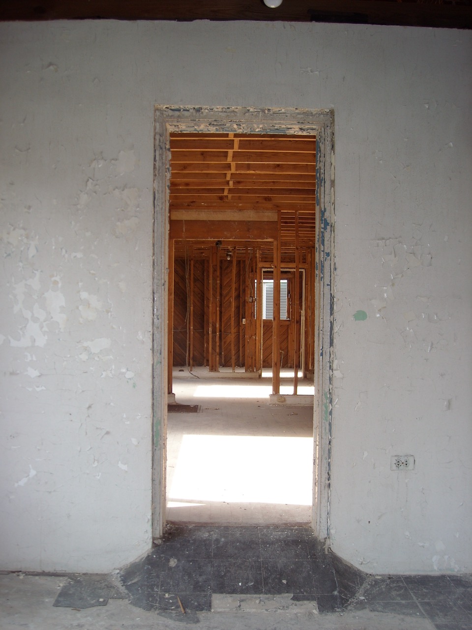 A door lets people move between in and out, but the entire building enclosure determines how much heat, air, and moisture move between in and out.