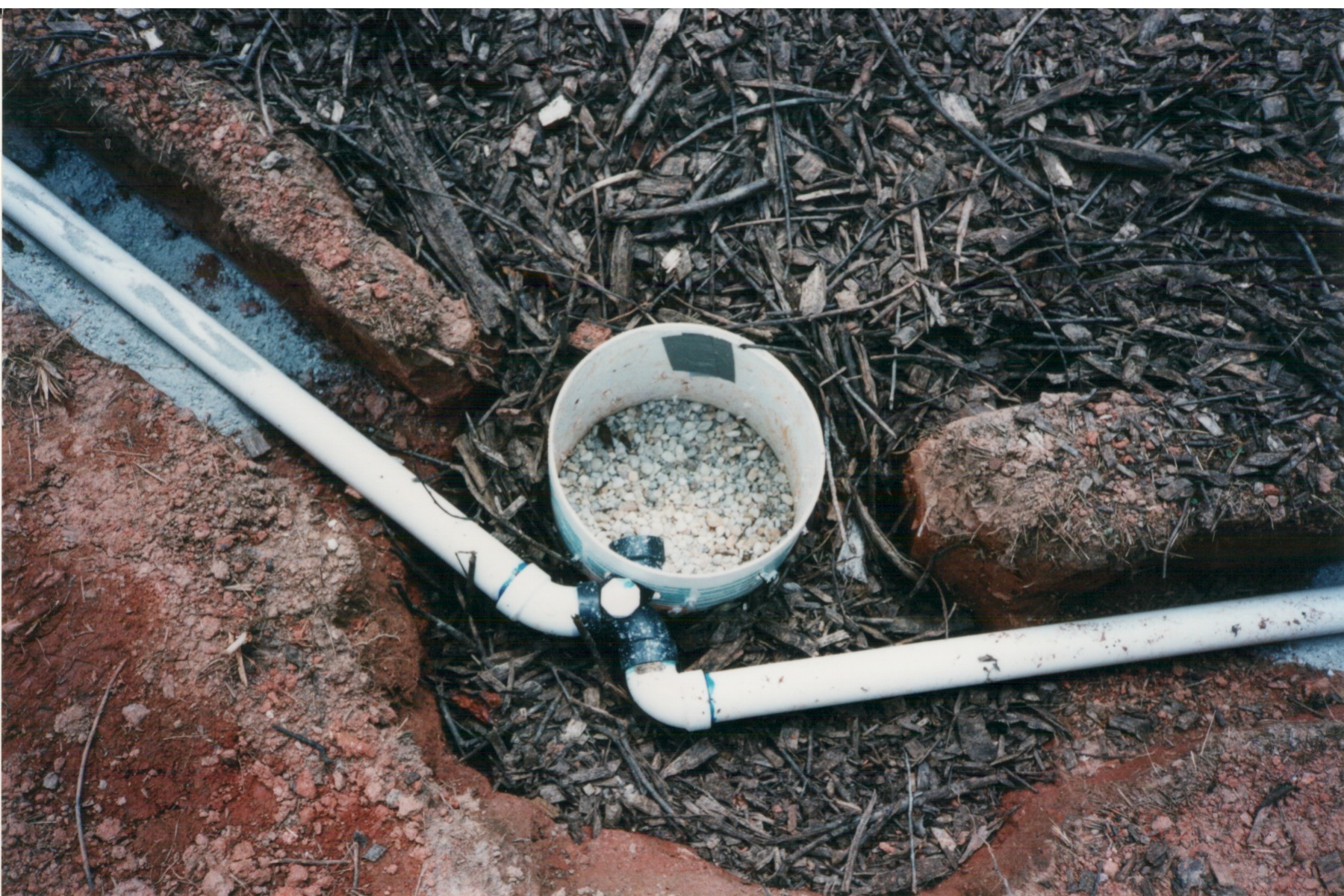 Construction of a branched drain greywater system: outlet bucket