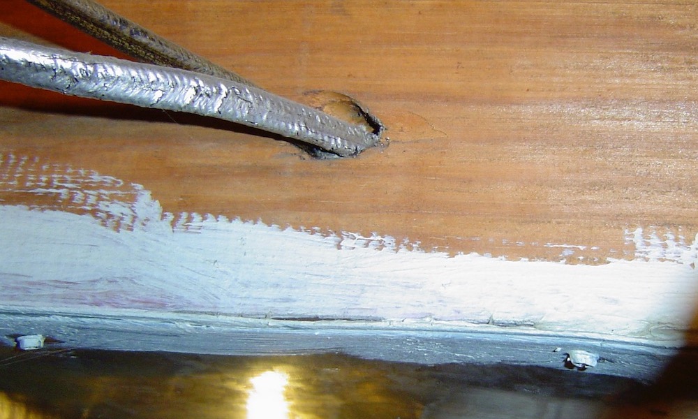 Panned joist return duct, with wiring holes unsealed