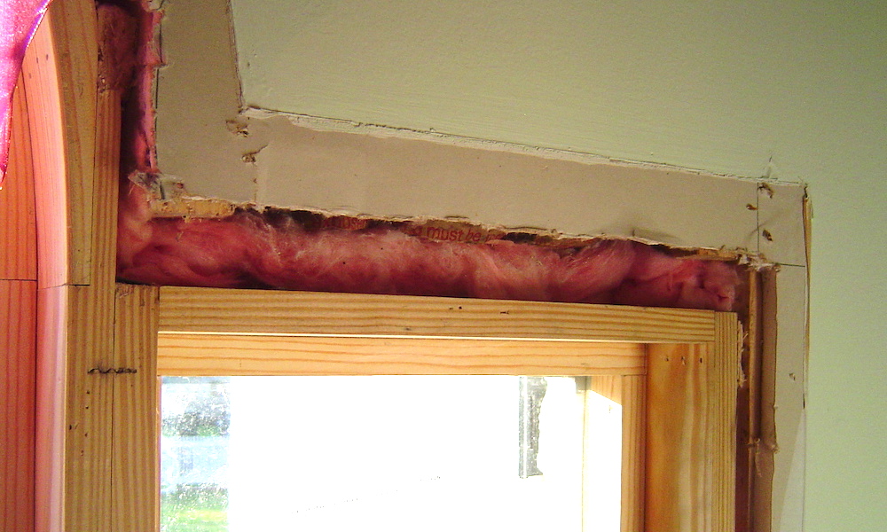 Stuffing fiberglass around the perimeter of a window is not sufficient to stop air leakage