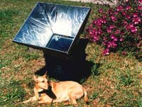 Solar Cooker Gathering The Sun's Energy To Cook A Meal