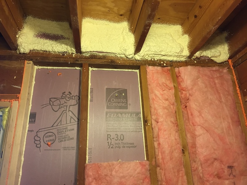 Foam board, spray foam, and fiberglass insulation provide an airtight and well-insulated wall