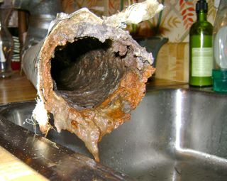 Dryer Vent Duct Caked With Wet Lint From Restricted Air Flow