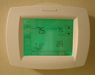 Setting the thermostat to the fan "on" position