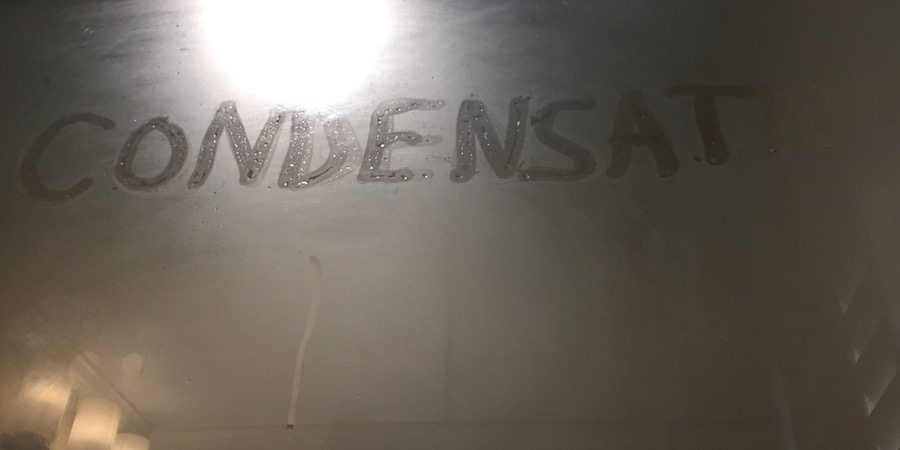 Condensation on a glass shower door