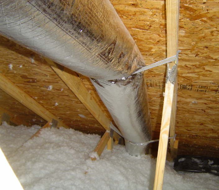 Duct against the roof deck in an unconditioned attic