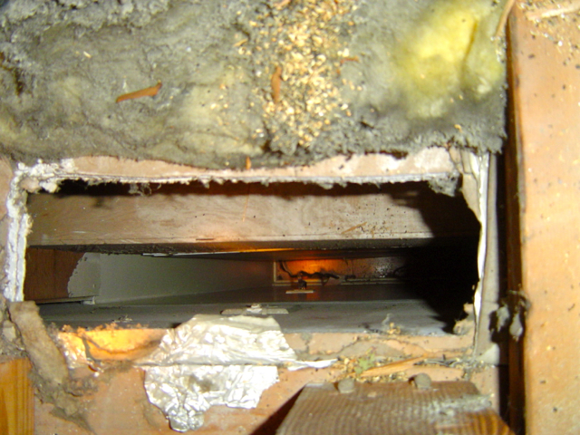 This hole in the ceiling lets hot attic air into the house