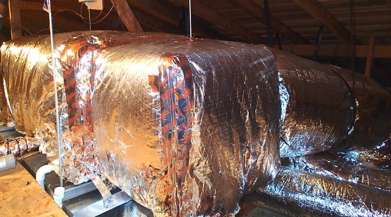 Air handler and plenums well insulated in an unconditioned attic [Photo by Mike MacFarland, used with permission]