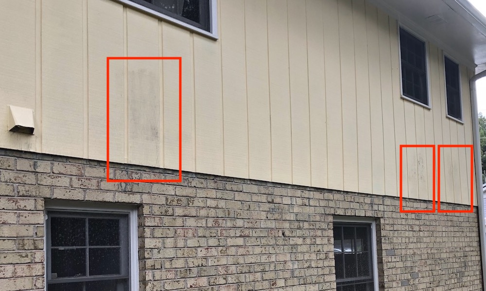 This house has uninsulated ducts in exterior walls. The discolored siding shows where they are.