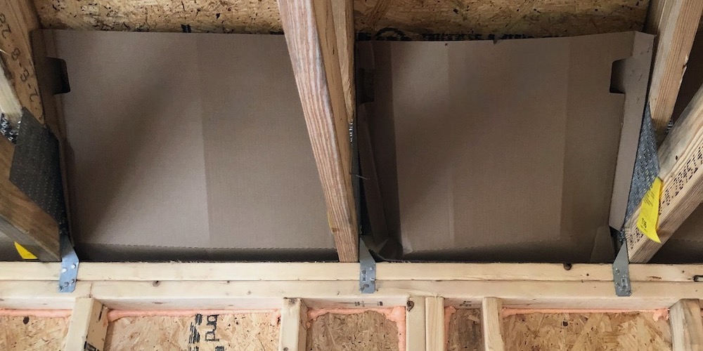 Attic venting baffles leave almost no room for insulation above exterior wall