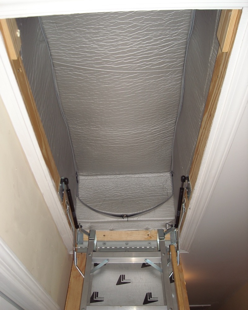 Attic pulldown stairs air-sealed with an Attic Tent