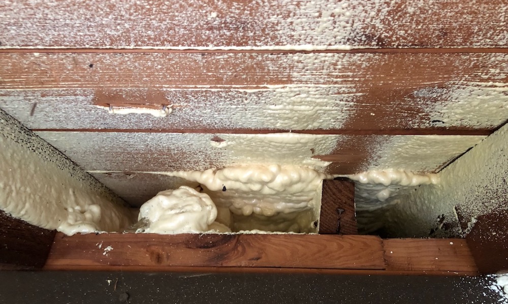 Spray foam insulation didn't fill the space above the exterior top plates