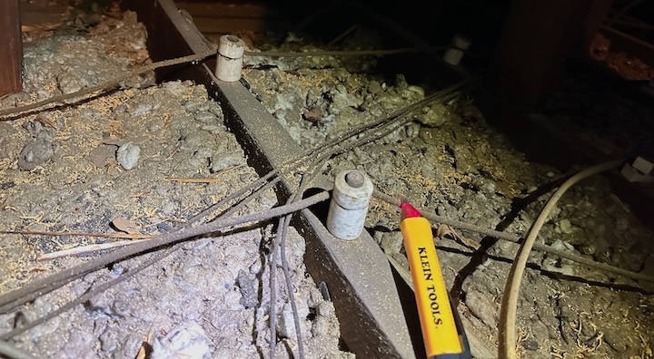 The old knob-and-tube wiring in the attic was still in use