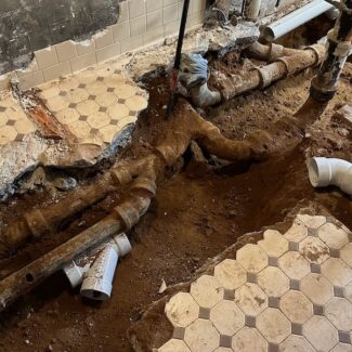 The Original Cast Iron Drain Lines Under The Basement Slab In Our 1961 House