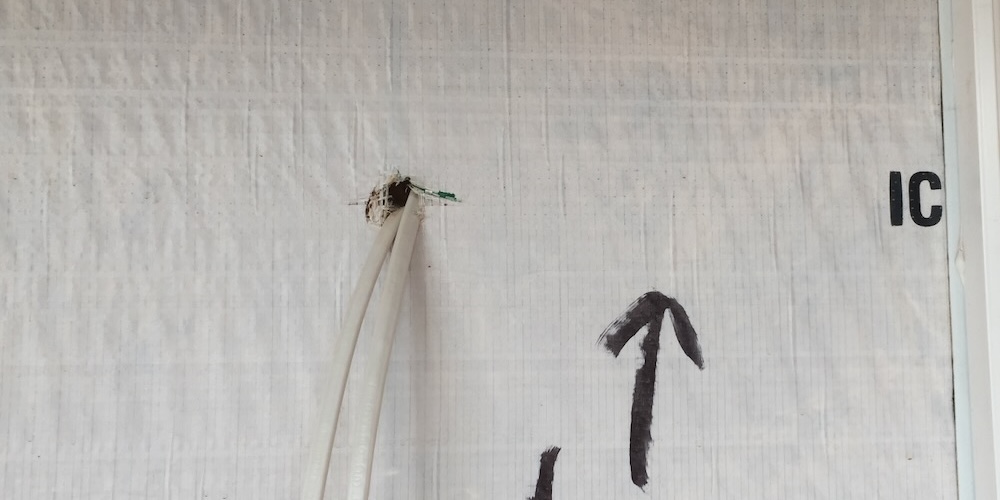 Two wires coming out of the same hole makes sealing more difficult.