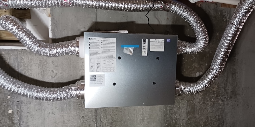 How Many Installation Problems Can You Identify In This Photo Of An Energy Recovery Ventilator In An Unconditioned Crawl Space? [Photo By Robert Jordan Of Achieve Home Energy Advisor]