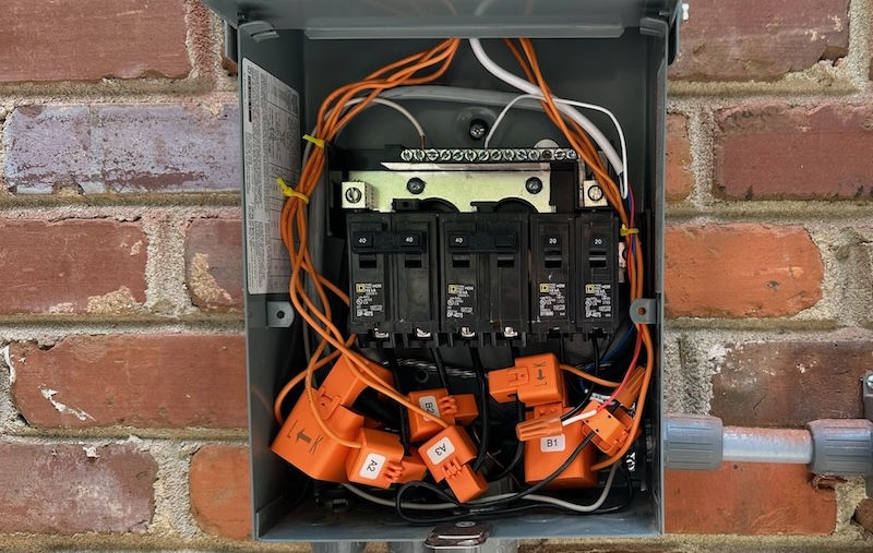 The sub-panel has enough room for the current transformers (CTs).
