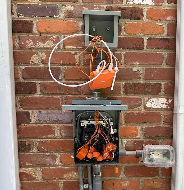 To make it all work, I had to install a separate enclosure above the sub-panel.